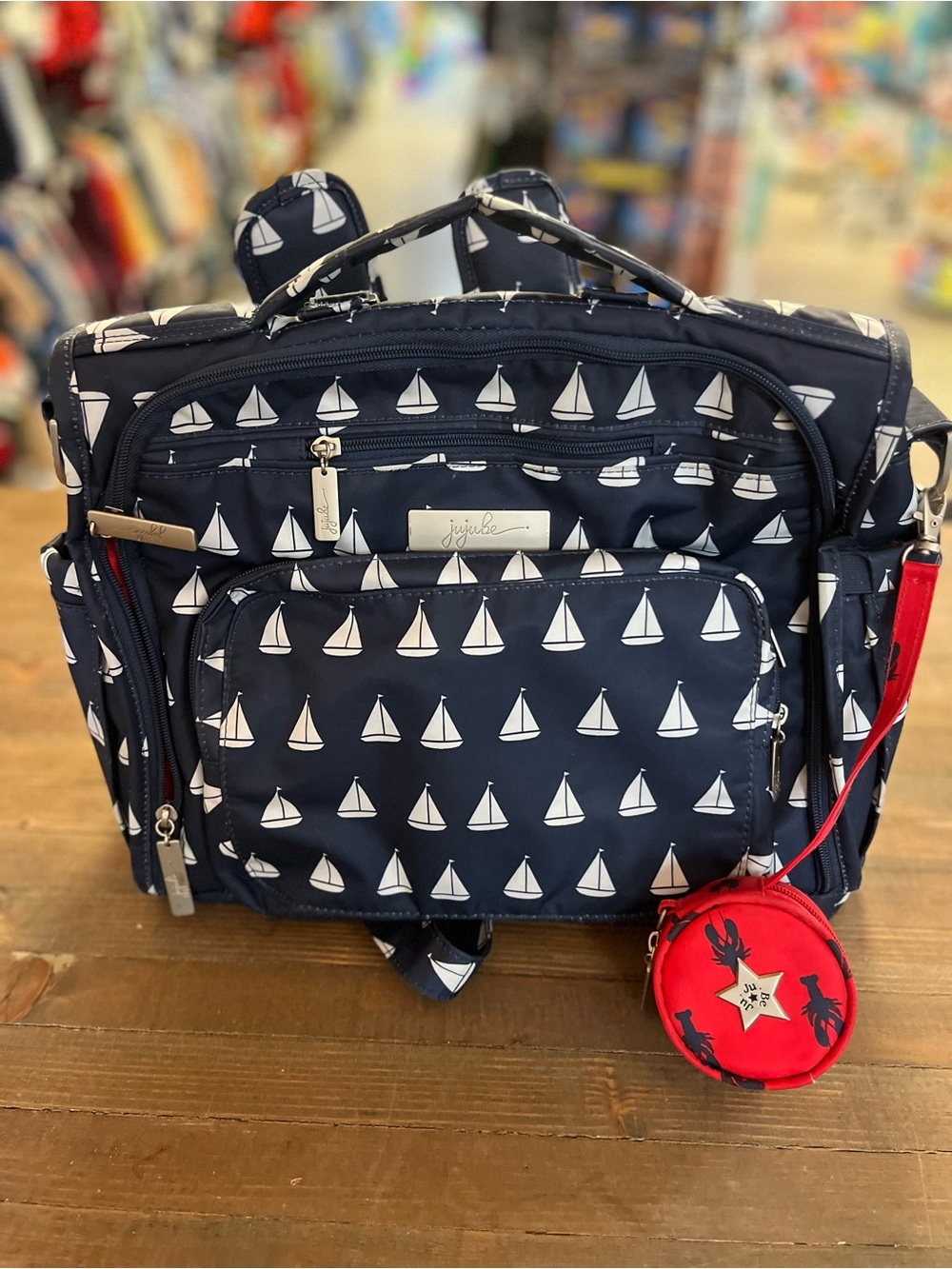 JuJuBe B.F.F. Convertible Diaper Bag in the nautical sailboat-patterned "Annapol
